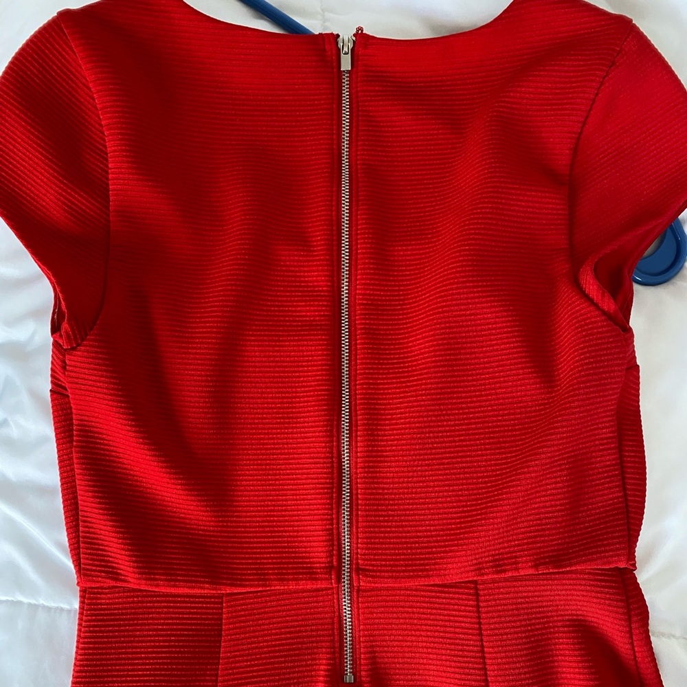 Express red dress in a size XS. Goes down to the knee but has a sexy slit. - Picture 4 of 6